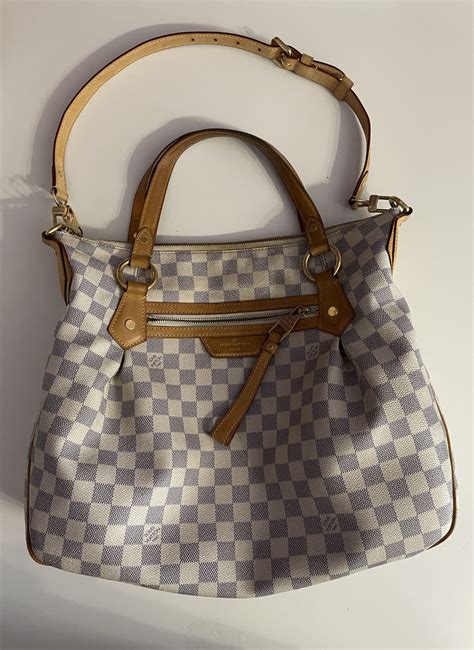 geanta louis vuitton originala.